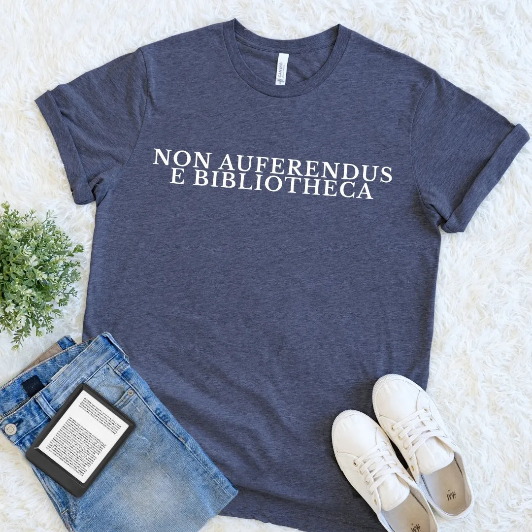 Heather Navy Non Auferendus E Bibliotheca library T-shirt with cream Latin typography meaning “do not remove from the library,” a vintage dark academia reader tee for book lovers, librarians, bibliophiles, and literary humor fans.