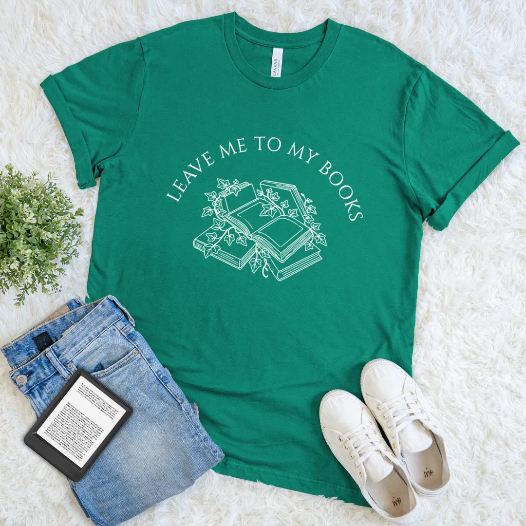 Minimalist green reader shirt featuring vintage-style book stack with ivy and literary quote "leave me to my books"