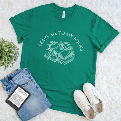 Minimalist green reader shirt featuring vintage-style book stack with ivy and literary quote "leave me to my books"