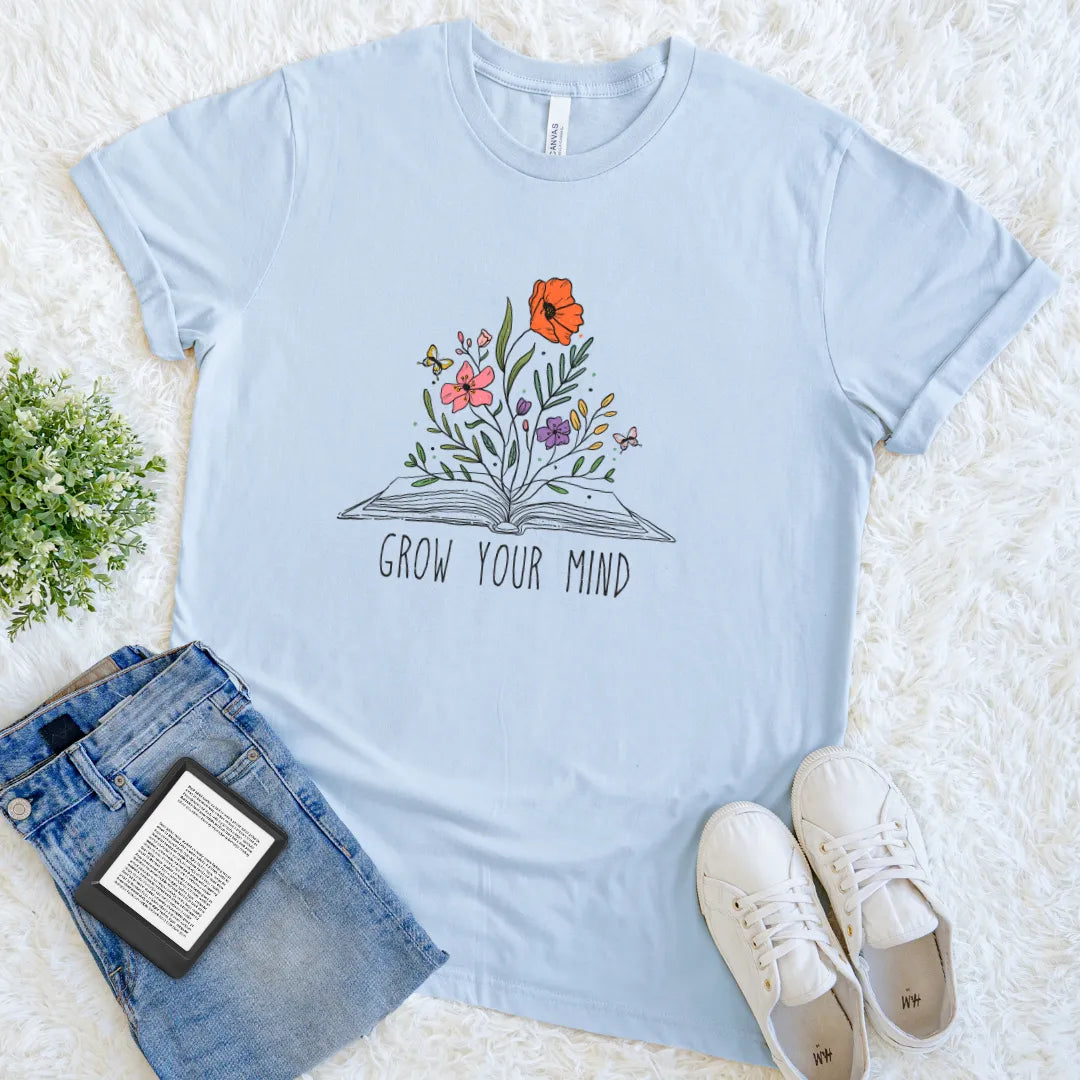 botanical reader tee with open book and flowers