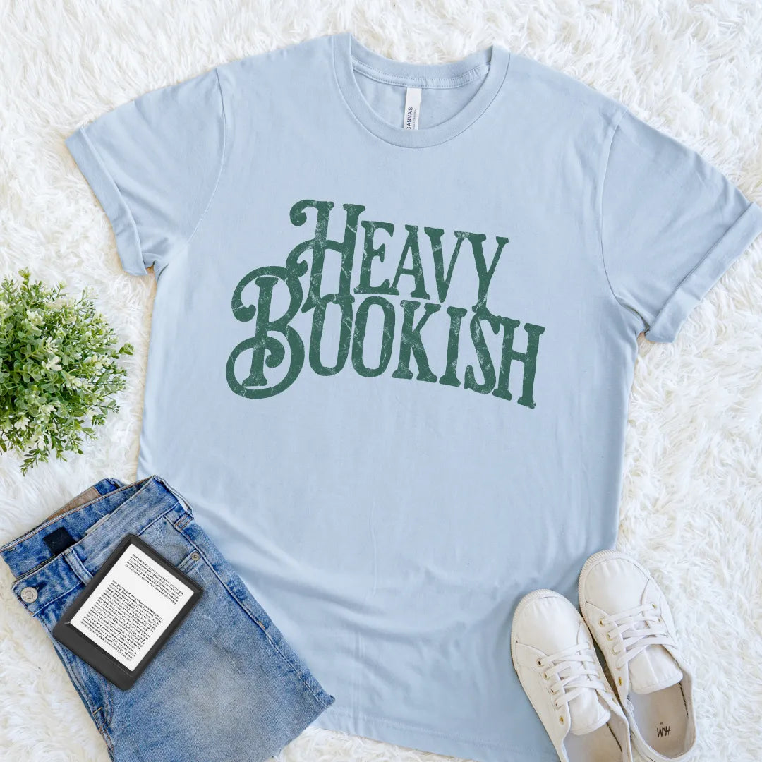 Soft light blue reader tee with oversized vintage typography graphic in muted green 