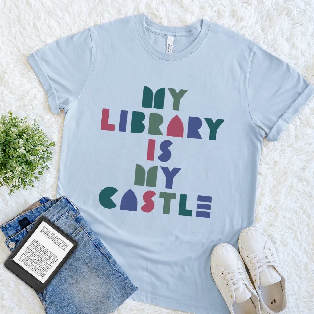 Light Blue My Library Is My Castle bookish T-shirt with colorful geometric lettering, a playful modern-retro library tee for devoted readers.