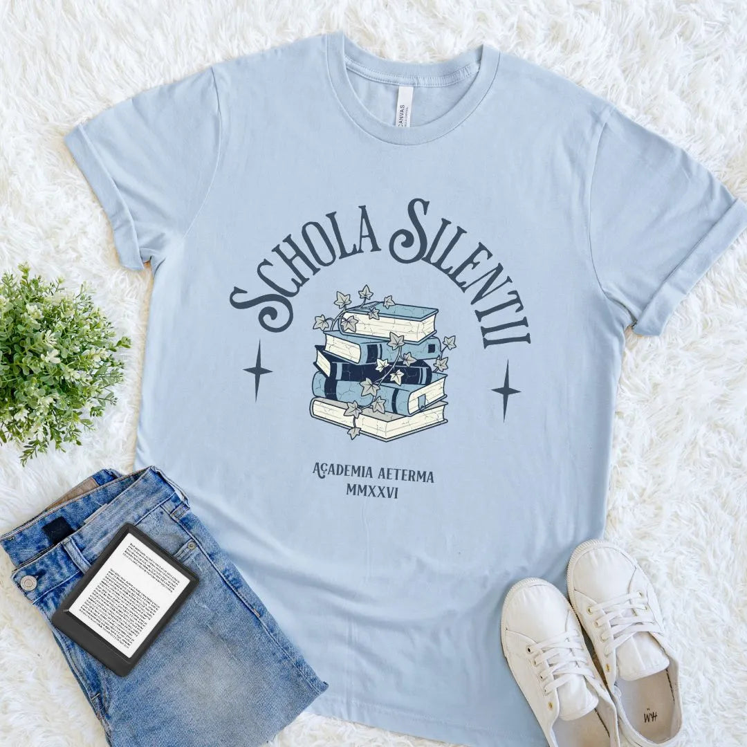 Vintage style reader shirt with blue toned book stack, latin quote  and ivy design on light blue  fabric