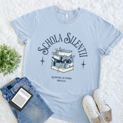 Vintage style reader shirt with blue toned book stack, latin quote  and ivy design on light blue  fabric
