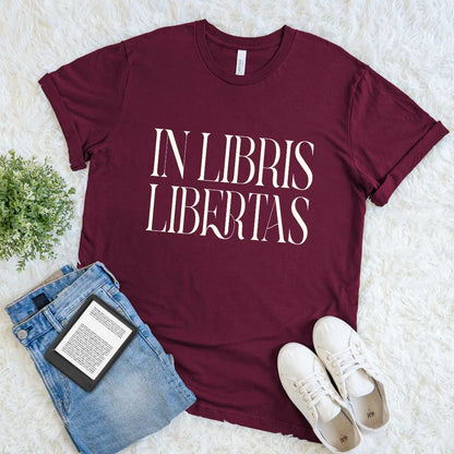 Burgundy dark academia graphic t shirt with serif Latin phrase “In Libris Libertas”, relaxed fit premium cotton bookish tee for readers and literature lovers