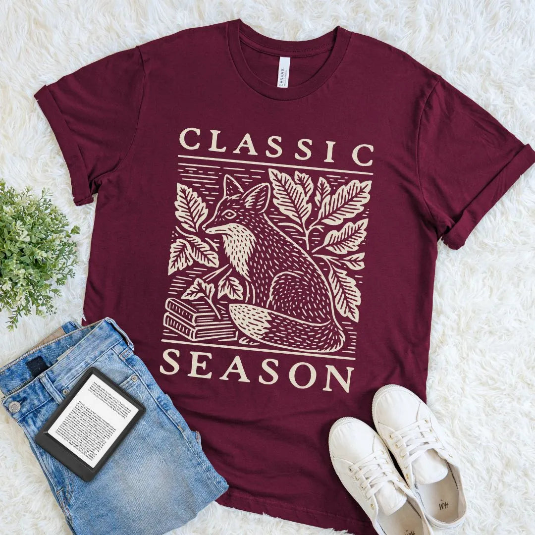 Maroon literary fox shirt featuring vintage book illustration and Classic Season typography for autumn readers