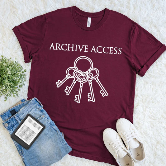 Minimalist reader shirt with antique key ring graphic inspired by libraries and archives on maroon red cotton 