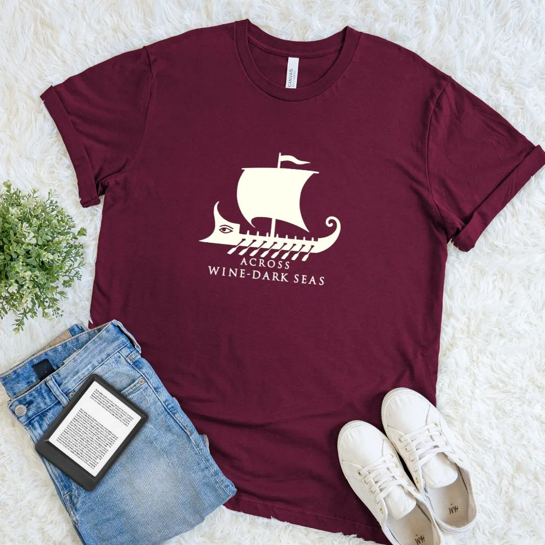 Literary T-shirt featuring a Greek galley sailing across the wine-dark sea on maroon red cotton 