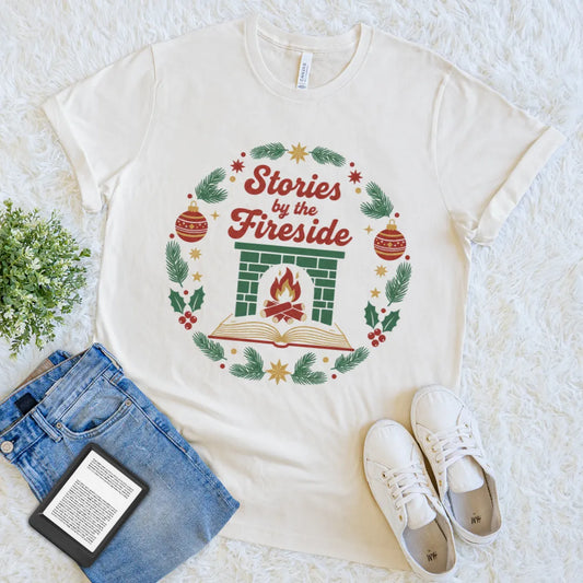 Cozy Christmas shirt featuring book and fireplace illustration