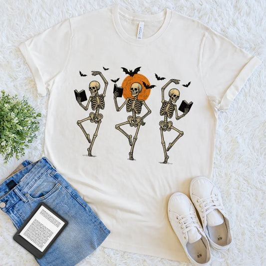 bookish Halloween tee with dancing skeletons and bats