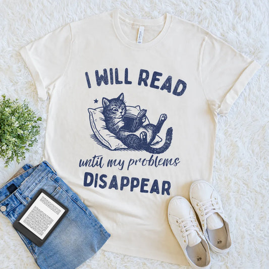Cream T-shirt with a cat reading a book and quote “I Will Read Until My Problems Disappear”