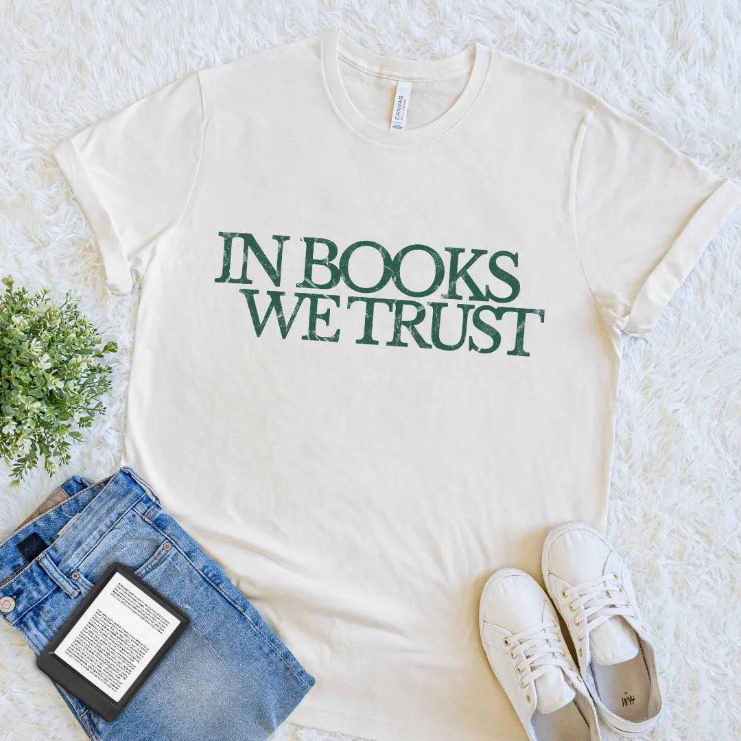 Cream book lover T-shirt with In Books We Trust vintage typography design in muted green 