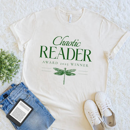 cream soft cotton  book lover T-shirt with green serif font and whimsical wilderkind  design in dark academia aesthetic