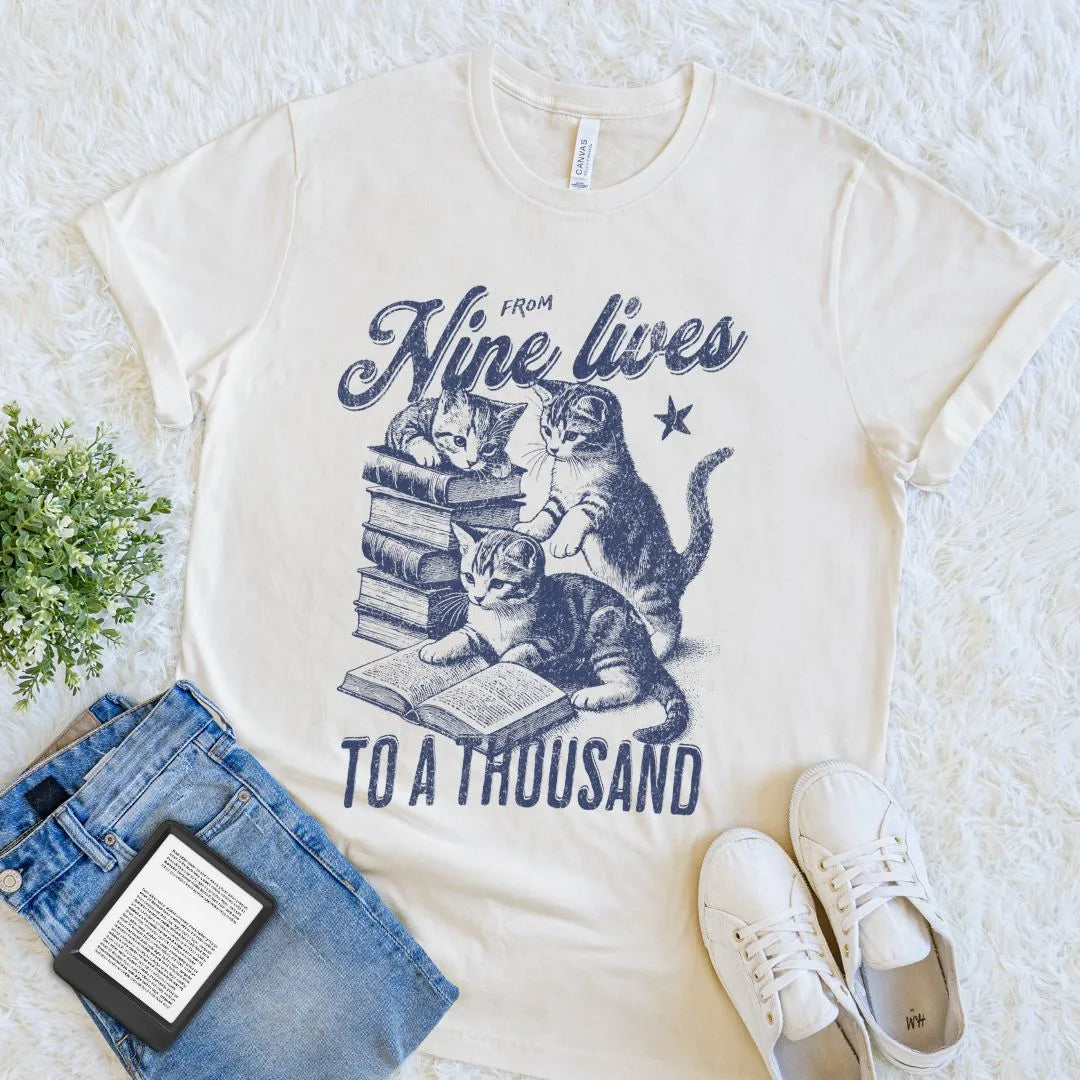 Soft cotton natural beige reader shirt featuring playful cats and open  book