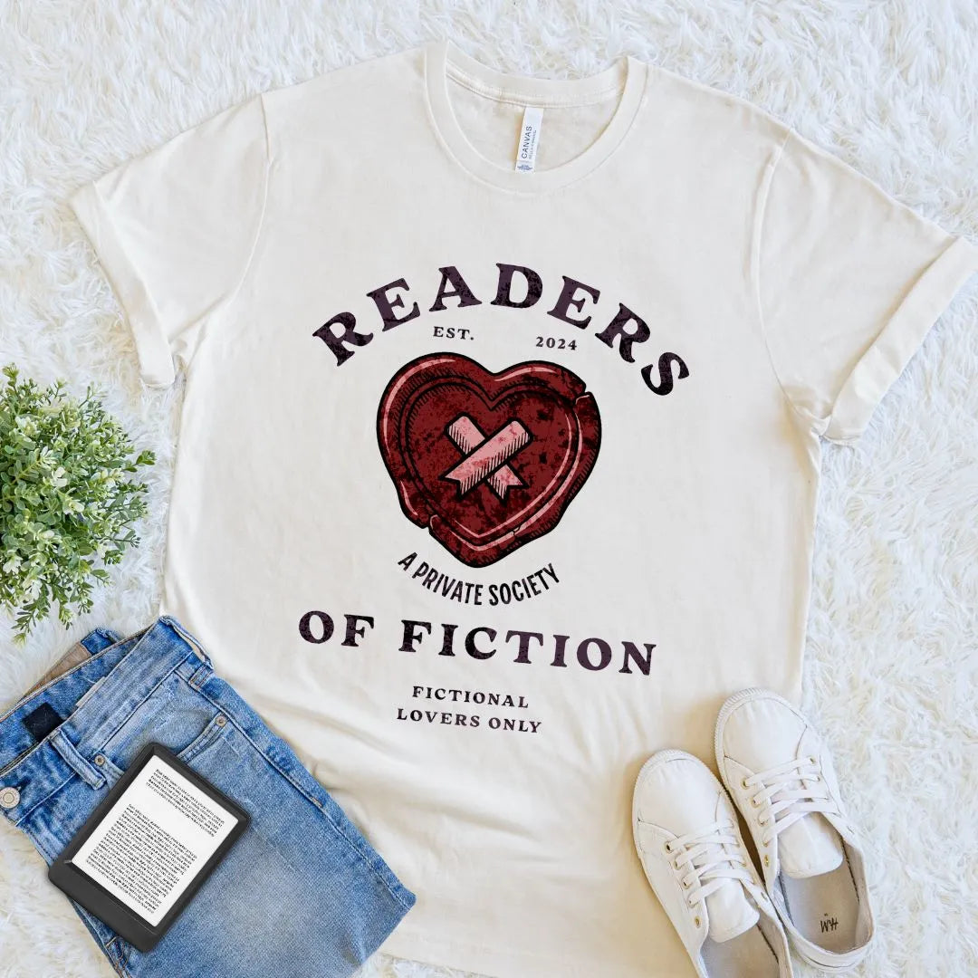 Flat lay of cozy soft cotton  literary shirt for book lovers featuring a heart with crossed bandages