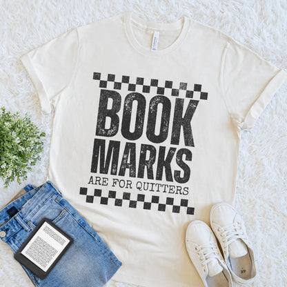 Flat lay of cream soft cotton edgy literary tee perfect for bookworms with attitude