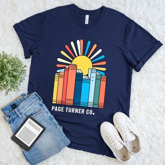 Vintage-style navy tee featuring books and a bold sunburst