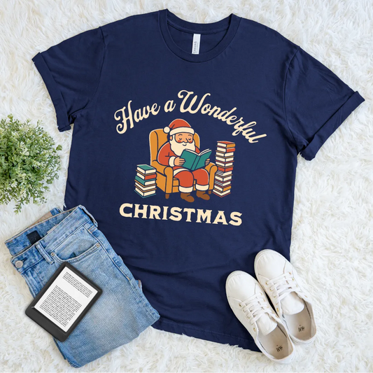 Cozy Christmas shirt with stacks of books and Santa reading on navy t-shirt