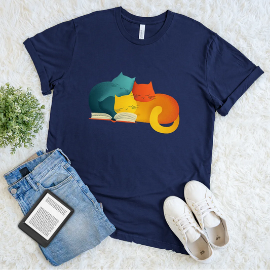 Navy blue T-shirt with colorful cats reading a book design