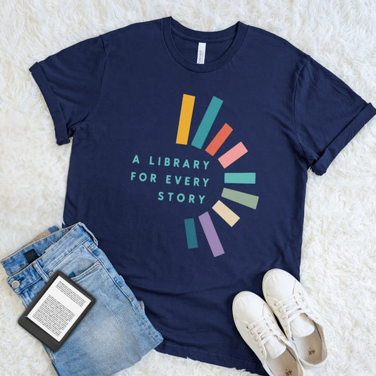 Navy A Library for Every Story book lover T-shirt featuring bright book-inspired graphics around a literary quote, a high-contrast reader shirt with playful library style.