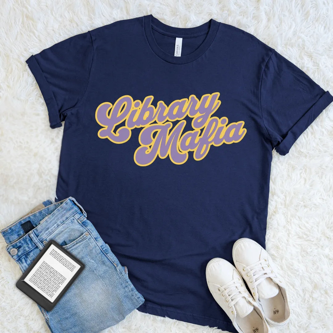 Navy retro bookish tee featuring the Library Mafia slogan in bold curved script for literary insiders