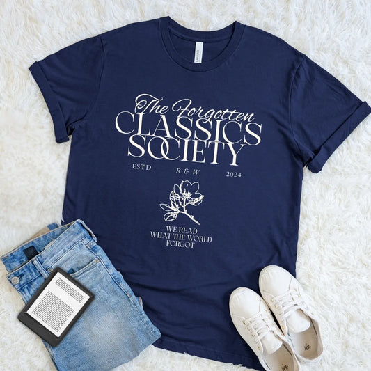 Navy Forgotten Classics Society literary T-shirt with elegant vintage typography, delicate floral details, and “We Read What the World Forgot,” a dark academia reader shirt for classic literature lovers.