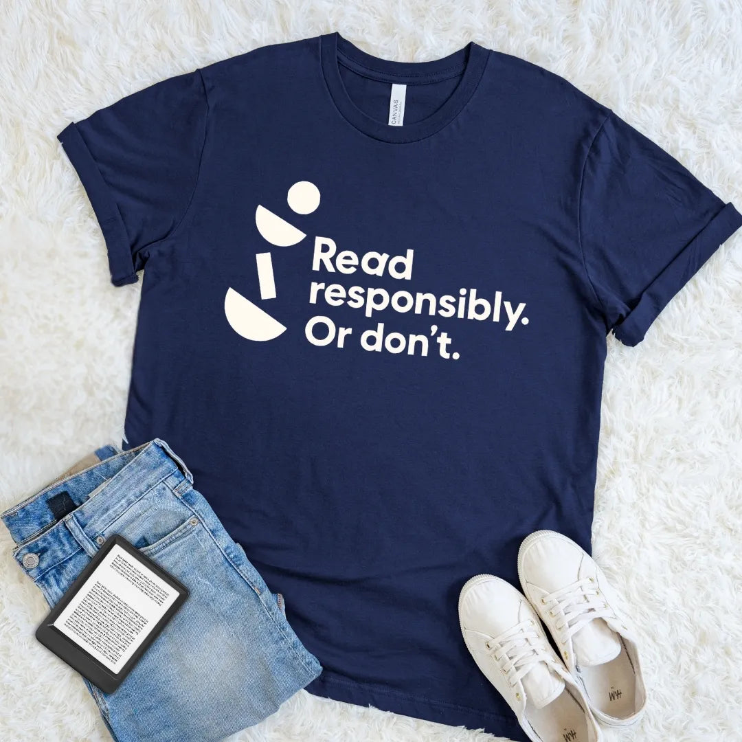 Navy Read Responsibly Or Don’t bookish T-shirt with clean modern typography and quirky geometric details, a minimalist literary humor shirt for readers.