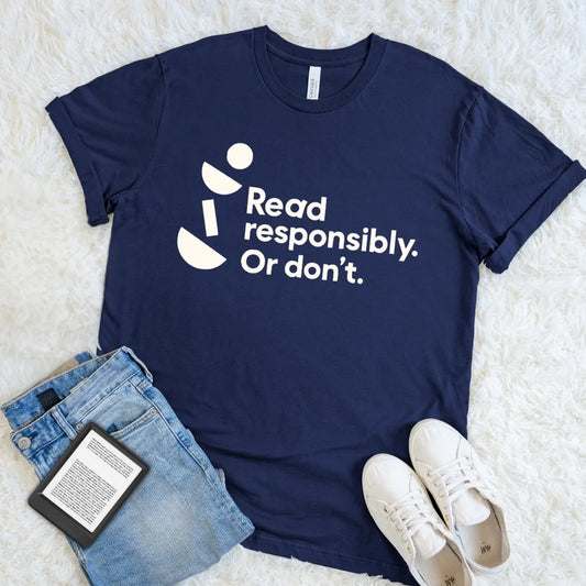 Navy Read Responsibly Or Don’t bookish T-shirt with clean modern typography and quirky geometric details, a minimalist literary humor shirt for readers.