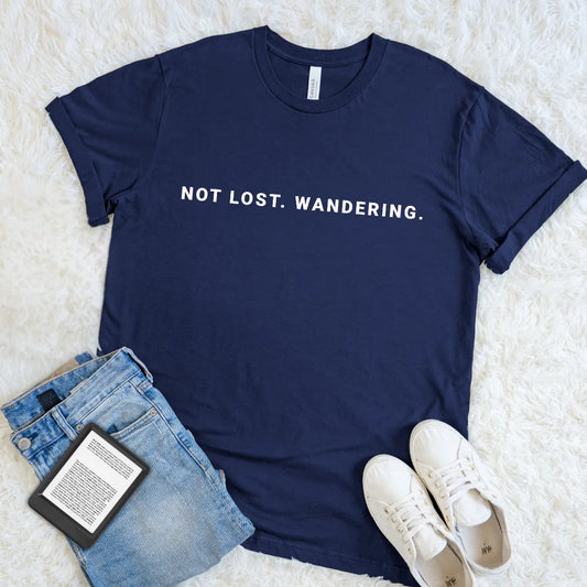 Navy Not Lost Wandering book lover T-shirt with clean minimalist typography, an understated literary humor shirt for curious readers and daydreamers.