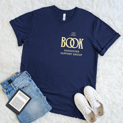 Soft cotton navy  literary shirt with serif typography and witty book quote styled as golden fashion logo 