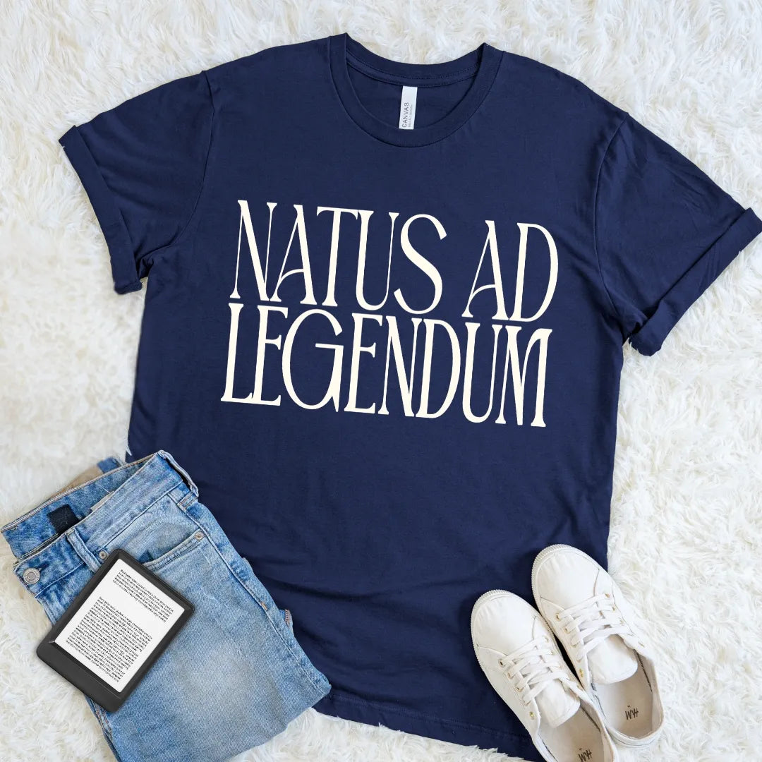  Navy  blue bookish T-shirt with Natus ad Legendum Latin phrase in elegant cream lettering.