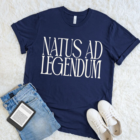  Navy  blue bookish T-shirt with Natus ad Legendum Latin phrase in elegant cream lettering.