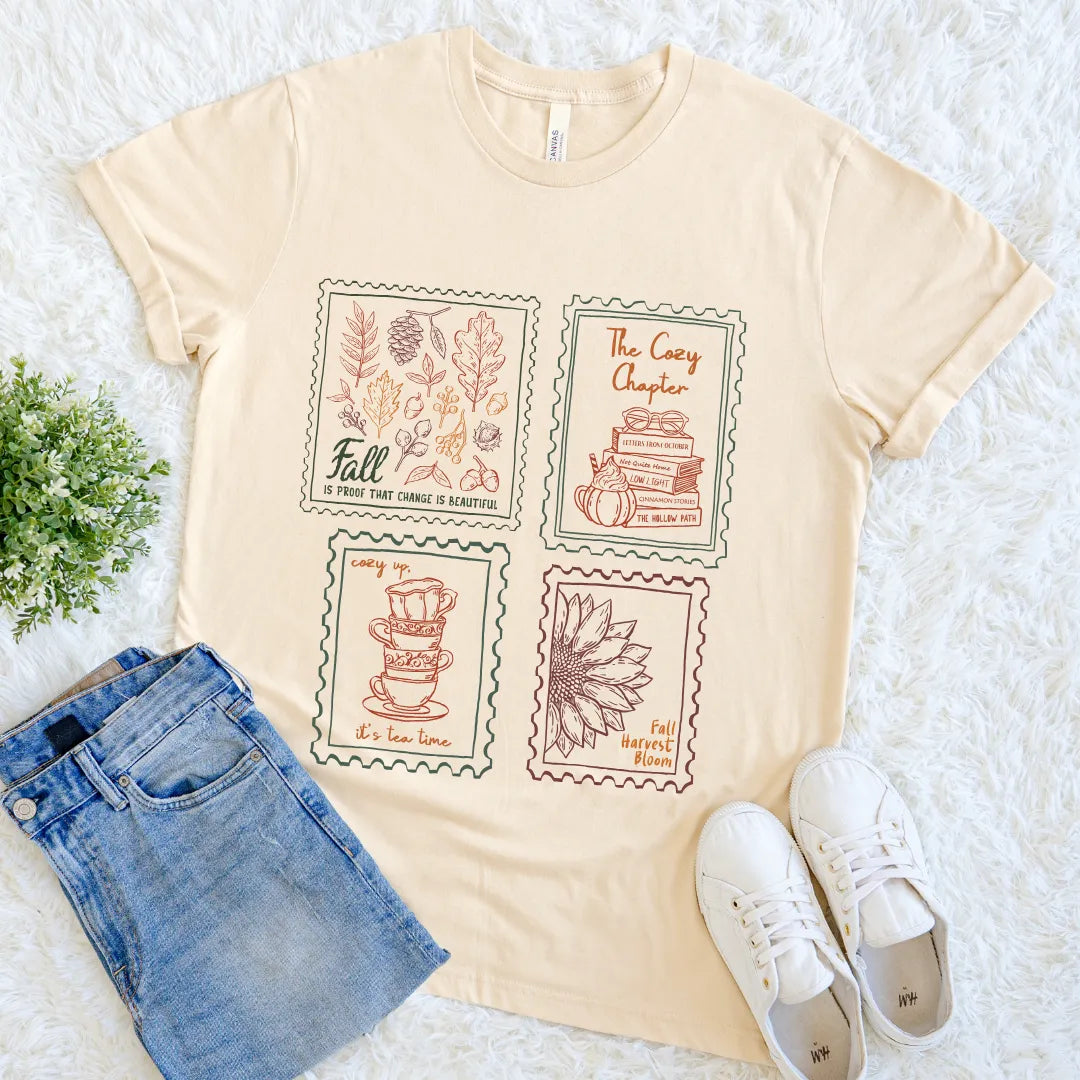 Soft cream bookish autumn tee with cozy motifs and seasonal quotes