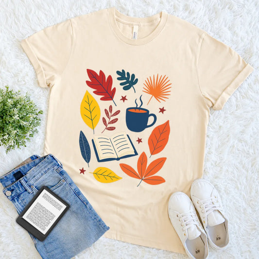 Cream T-shirt with autumn leaves, book, and coffee design