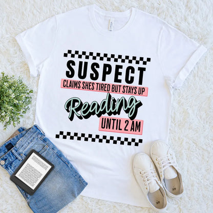 flat lay of white soft cotton pastel checkered shirt with "suspect reading until 2am" quote