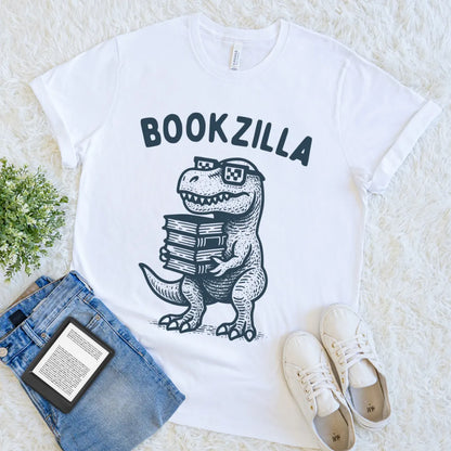 White Soft cotton T-shirt with a cartoon T-rex holding books and wearing pixel glasses