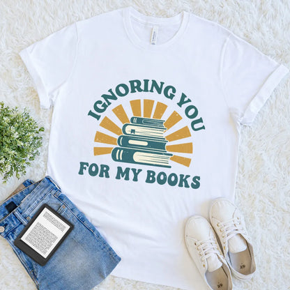 White T-shirt with retro “Ignoring You for My Books” text