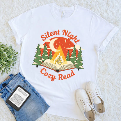 White T-shirt with open book campfire and pine tree illustration
