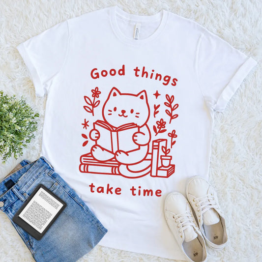 White T-shirt with cute cat reading on stacked books