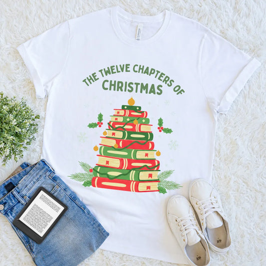 Graphic tee with holly, snowflakes, and book stack Christmas design