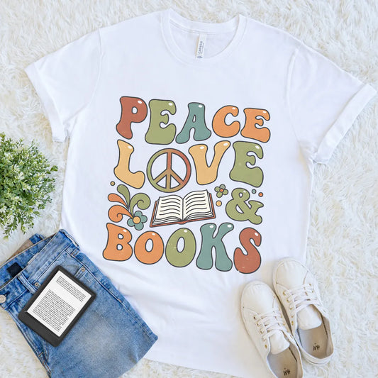 White T-shirt with groovy “Peace Love & Books” design and open book