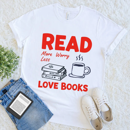 White tee with “Read More Worry Less Love Books” text and simple doodle  illustrations