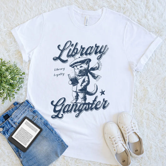 White soft cotton  T-shirt with vintage-style gangster cat holding a book and wearing scarf and beret with "Library gangster,  library loyalty " quote