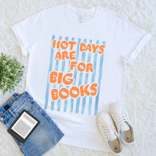 White t-shirt with 'Hot days are for big books' text on a light background, funny summer reading t-shirt