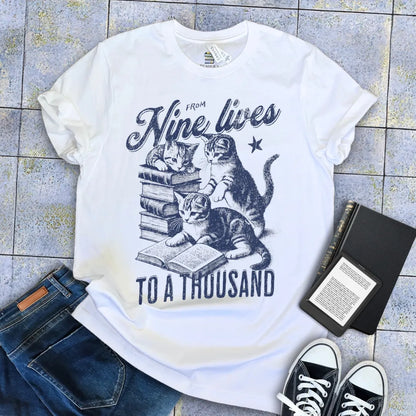 whimsical literary t-shirt with cats and books