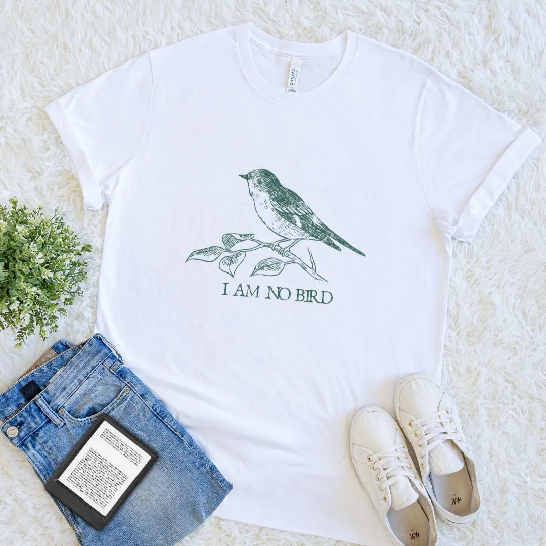 Vintage-style white reader shirt featuring perched bird sketch and classic quote text