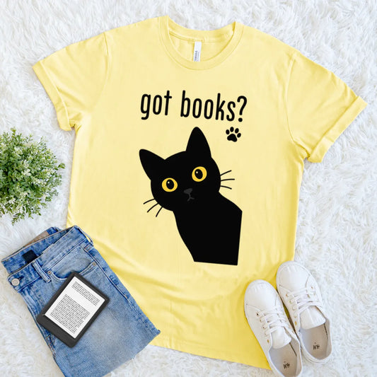Fun yellow bookish shirt with bold cat illustration for readers