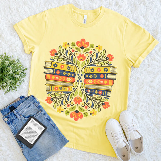 Colorful bookish T-shirt for readers and introverts with books and floral details