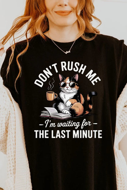 woman wearing black soft cotton   t-shirt with cat reading a book  design  and bookish quote