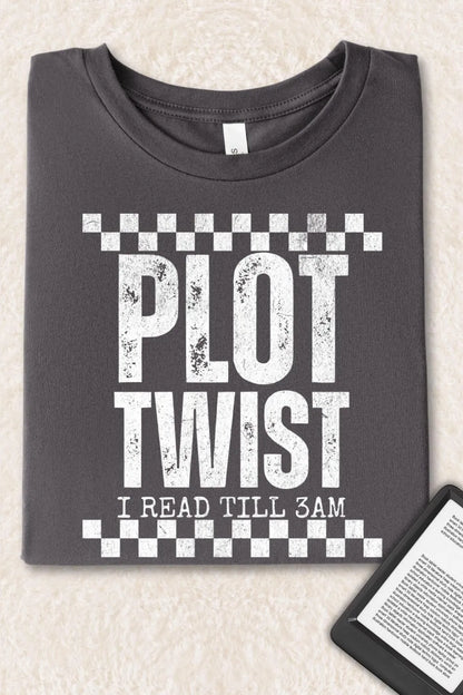 Folded  asphalt gray bookish T-shirt with distressed white text “Plot Twist – I Read Till 3AM”